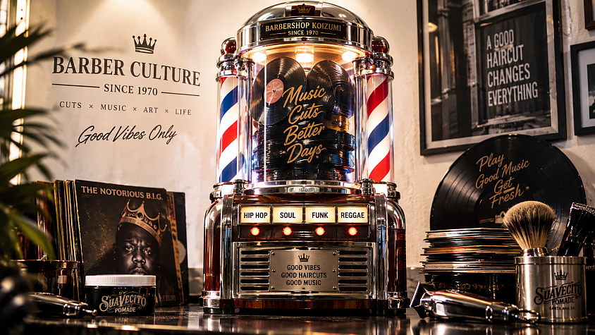 Barber pole jukebox blending barber culture, music and street style.